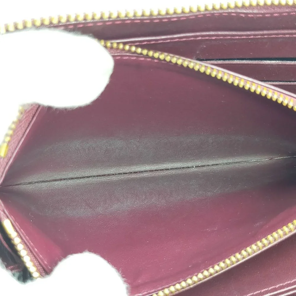 authentic  Louis Vuitton  Zippy Wallet Amarante vernis